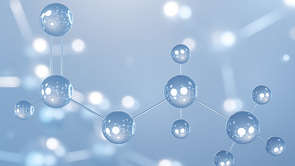 Illustration of a molecular structure made of glossy, translucent spheres connected by thin rods, representing atoms and bonds. The soft blue background emphasizes concepts in chemical biology and molecular interactions.
